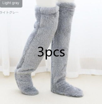 Chaussettes d'hiver chaudes et duveteuses au-dessus du genou